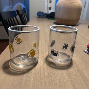 Anthropologie Handcrafted Glass Tumblers with Sun and Animal Motifs (set of 2)